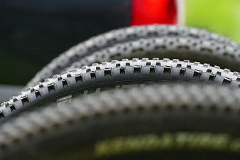 Close-up of bicycle tire tread pattern with shallow depth of field
