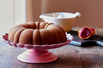Homemade Bundt Cake on Pink Stand with Blood Orange