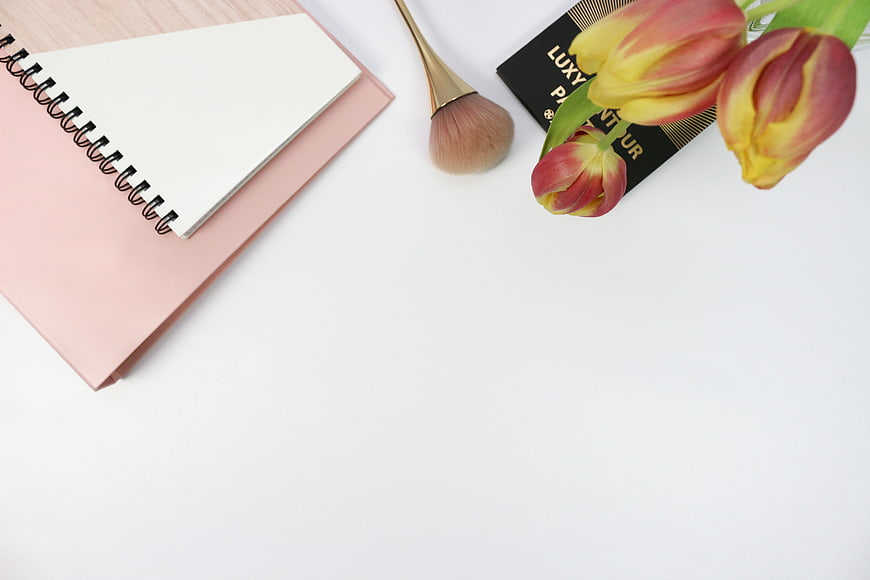Pink Notebook, Makeup Brush, and Tulips Flat Lay