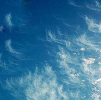 Blue sky with wispy cirrus clouds pattern