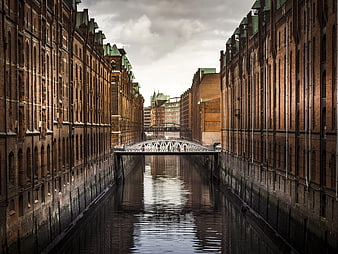 Symmetrical View of Speicherstadt Canal and White Bridge