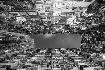 Black and white inverted cityscape of Hong Kong architecture