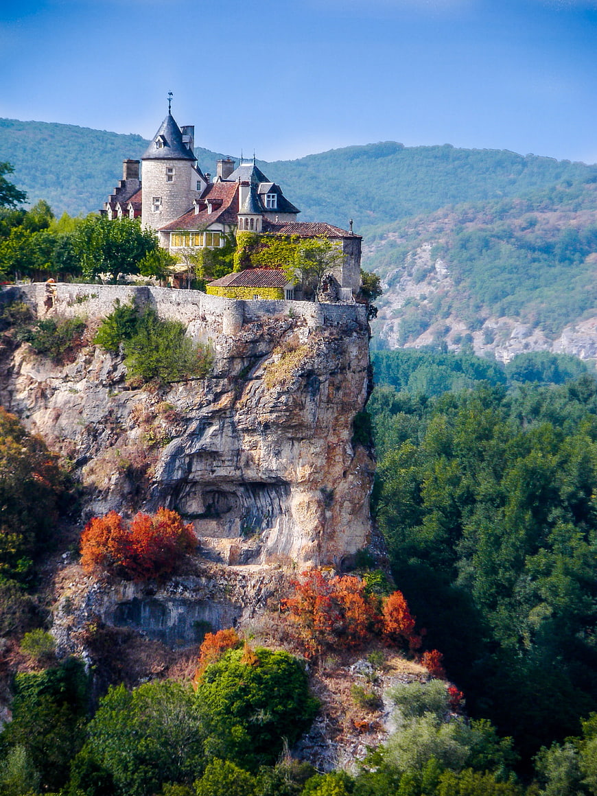 Medieval Castle Perched on Dramatic Rock Formation in Perigord