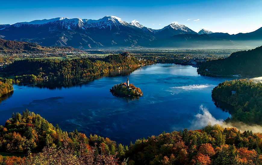 Autumn Landscape of Lake Bled with Church Island and Snowy Mountains
