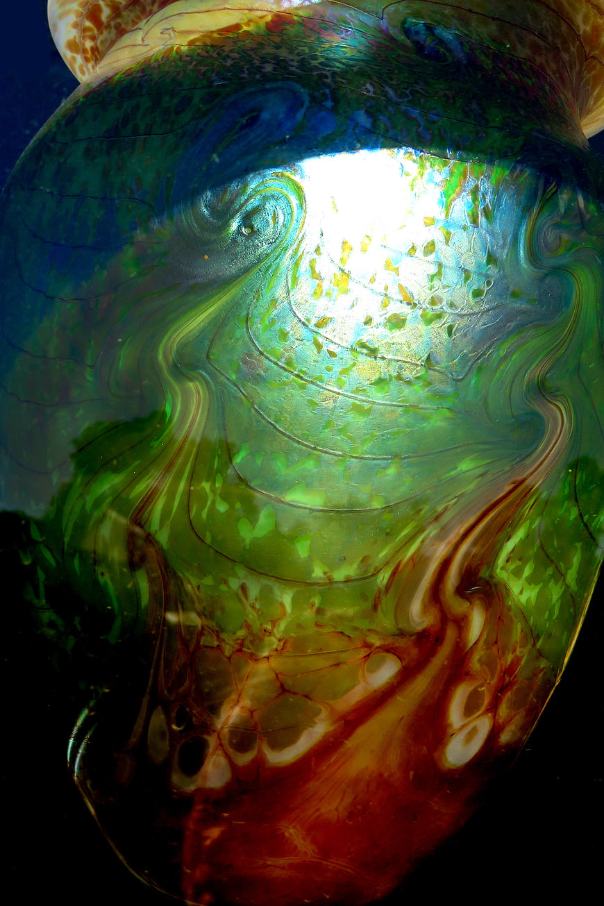 Abstract Swirly Green Glass Texture with Iridescent Highlights