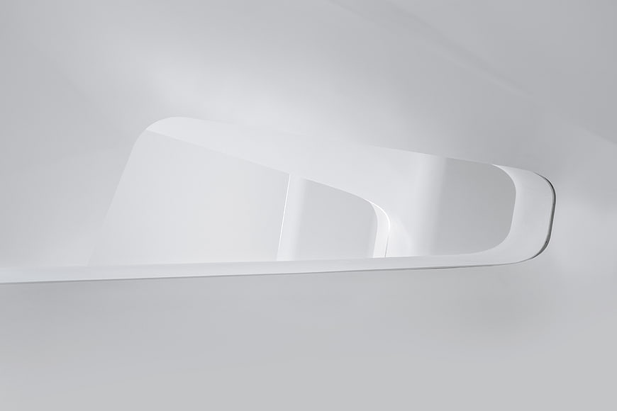Minimalist White Architectural Detail with Curved Lines