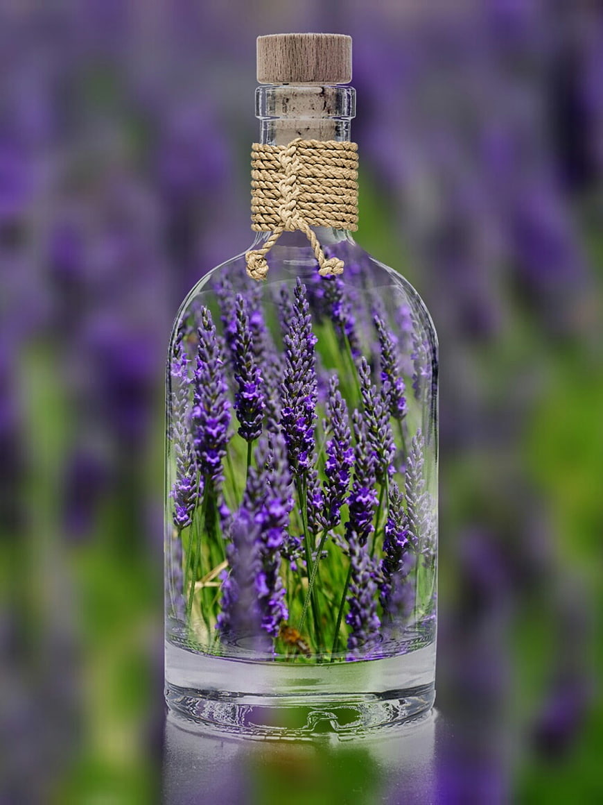 Glass bottle with dried lavender flowers and cork stopper