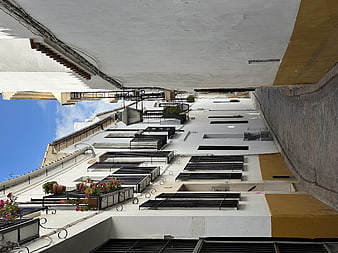 White Mediterranean Buildings in Narrow European Street