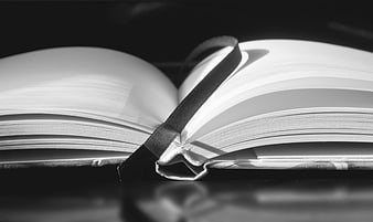 Open Book With Bookmark Ribbon Black And White Close Up