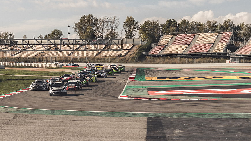 GT Racing Cars on Circuit Track with Grandstands