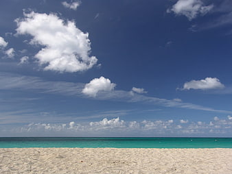 Tropical Beach Landscape With Turquoise Sea And Blue Sky