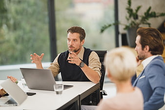 Businessman explaining strategy during office meeting
