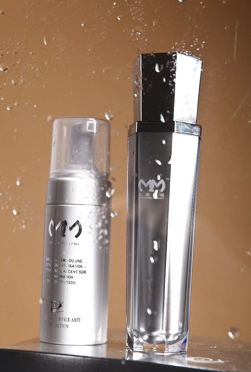 Silver Skincare Bottles with Water Droplets