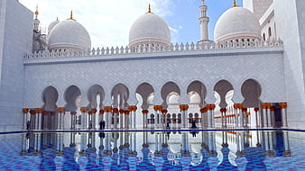 Sheikh Zayed Grand Mosque reflection in blue pool