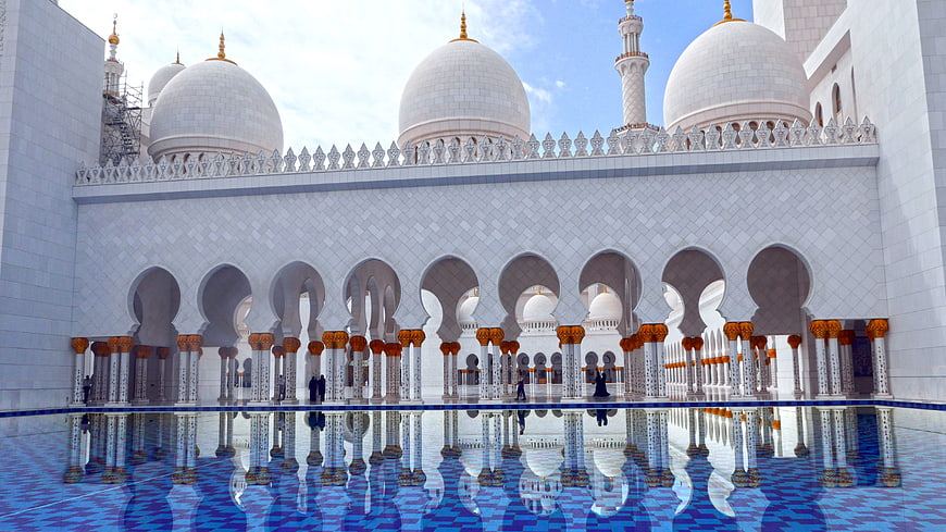 Sheikh Zayed Grand Mosque reflection in blue pool