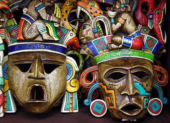 Colorful Traditional Mexican Wooden Masks with Intricate Carvings