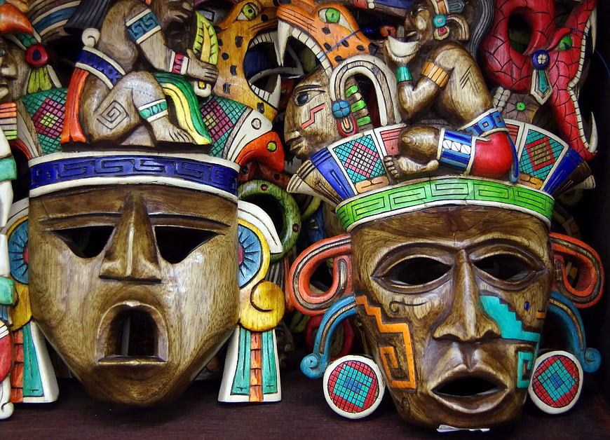 Colorful Traditional Mexican Wooden Masks with Intricate Carvings