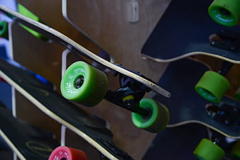 Close-up of Skateboard Wheels and Trucks on Display Rack
