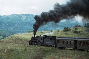 Vintage Steam Train Climbing Mountain Hillside