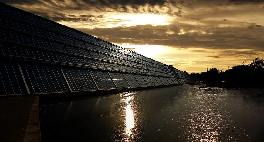 Floating Solar Panels on Lake at Golden Hour