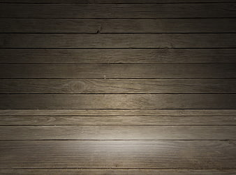 Dark rustic wooden plank background with dramatic spotlight effect