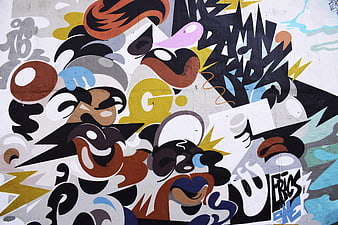Colorful abstract graffiti mural on urban concrete wall