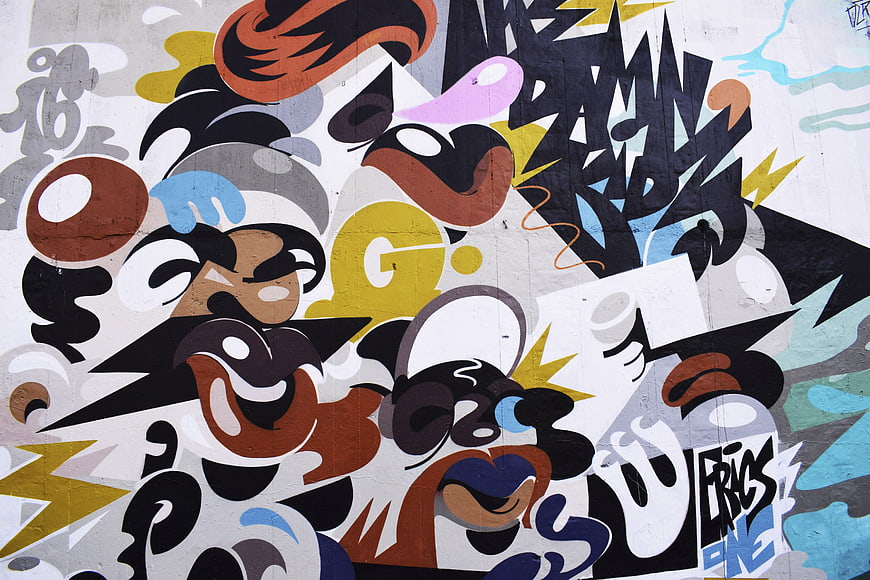 Colorful abstract graffiti mural on urban concrete wall