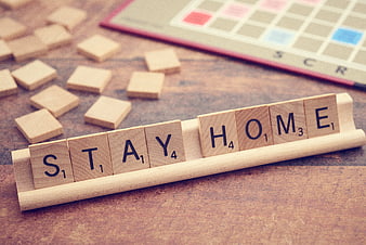Stay Home Scrabble Tiles on Wooden Rack