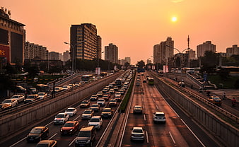 Busy Highway Traffic at Golden Hour Sunset