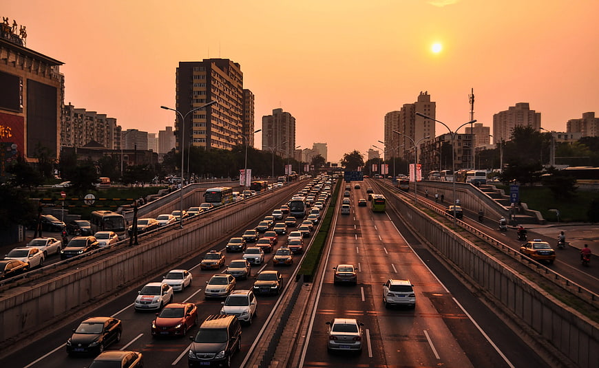 Busy Highway Traffic at Golden Hour Sunset