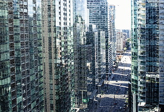 High Angle View of Modern Glass Skyscrapers and City Street