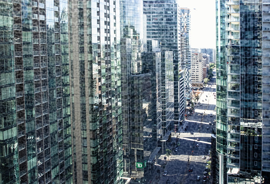 High Angle View of Modern Glass Skyscrapers and City Street