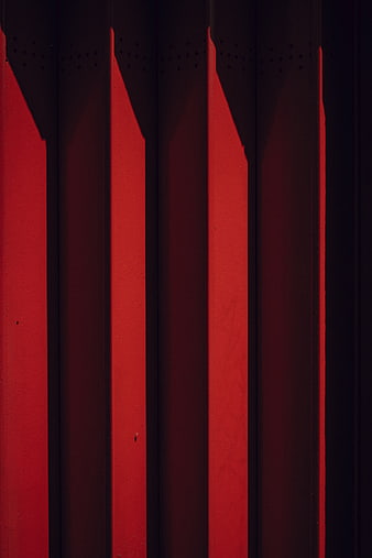 Abstract Red Corrugated Metal Wall with Shadows