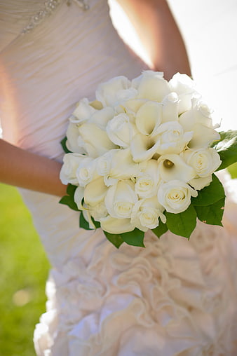 Bride Holding White Rose and Calla Lily Wedding Bouquet