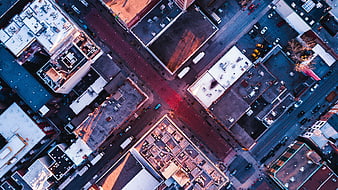 Aerial View of Urban City Intersection with Rooftops