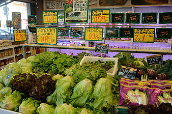 Fresh Vegetable Display With Price Tags In Supermarket