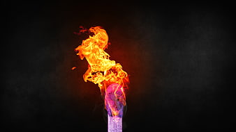 Lit Matchstick Burning with Bright Orange Flame on Black Background