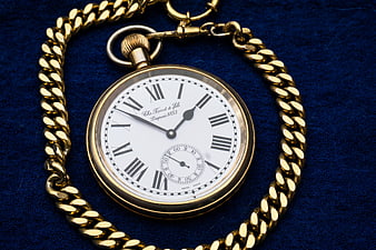 Vintage Gold Pocket Watch With Chain On Blue Velvet