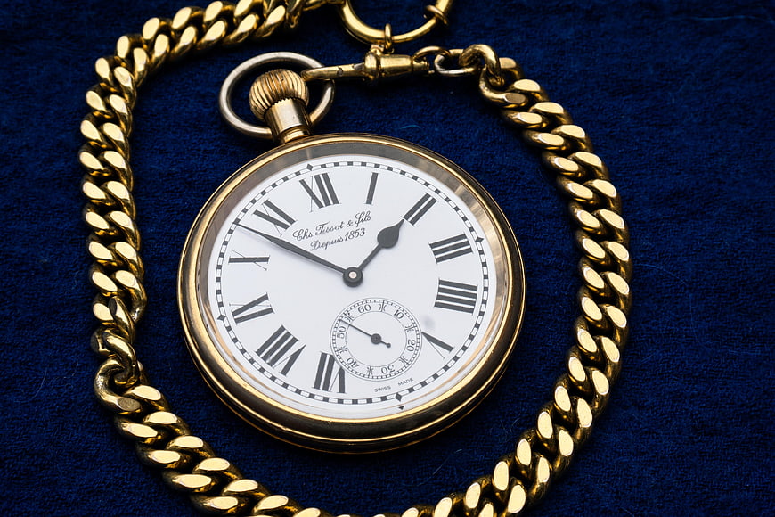 Vintage Gold Pocket Watch With Chain On Blue Velvet