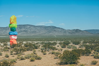 Colorful Painted Rock Stack in Desert Landscape