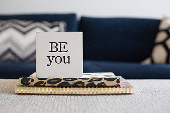 Inspirational Be You Block on Stack of Notebooks