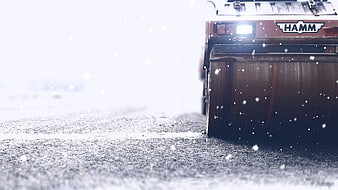 Hamm Road Roller Compacting Asphalt in Snow