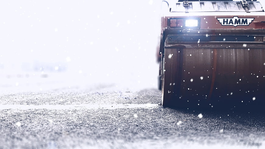 Hamm Road Roller Compacting Asphalt in Snow