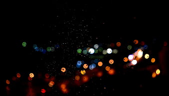 Abstract Bokeh Lights on Rainy Night Background