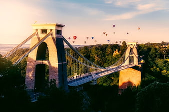 Clifton Suspension Bridge with Hot Air Balloons at Sunrise