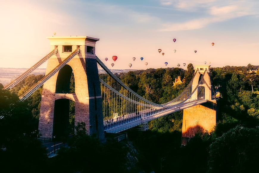 Clifton Suspension Bridge with Hot Air Balloons at Sunrise