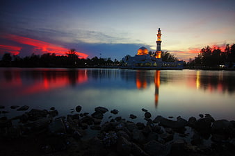 Istana Nur Mosque at Dusk with Red Sky Reflection