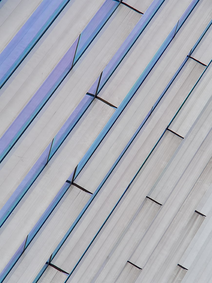 Abstract Diagonal Metal Roof Texture with Blue and Silver Strips