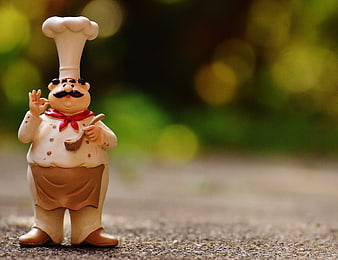 Charming Ceramic Chef Figurine With Red Scarf And Wooden Spoon