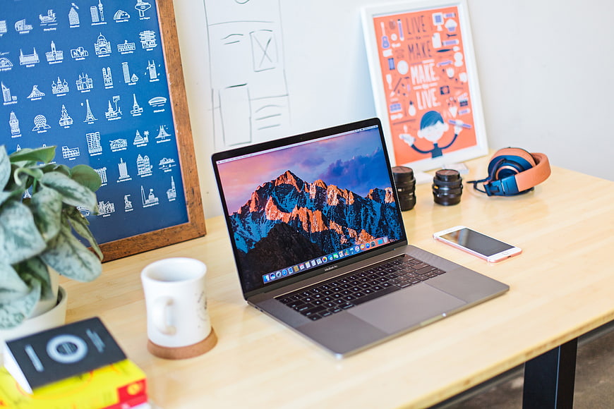 Modern Creative Workspace with Laptop and Headphones